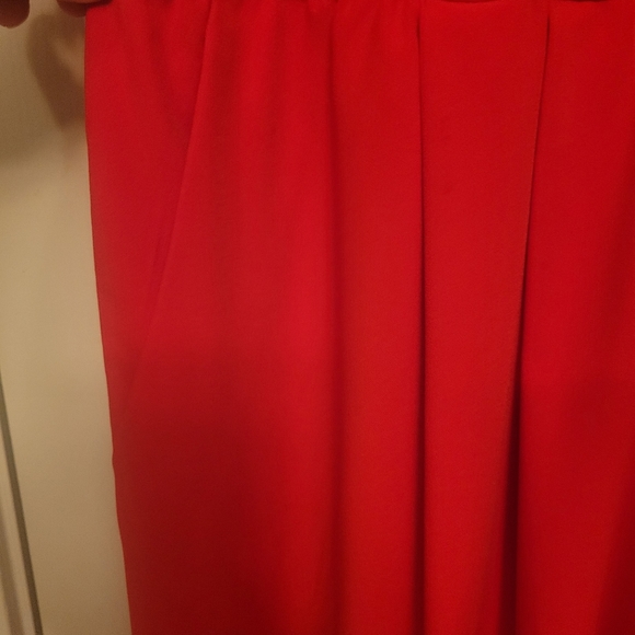 Red V neck wide legged jumpsuit. - Picture 3 of 3